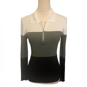 Women's sweater/shirt. Size Large (11-13).
Brand new (without tags).